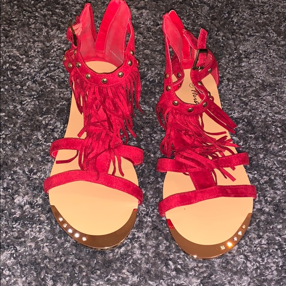 Red open toed sandals